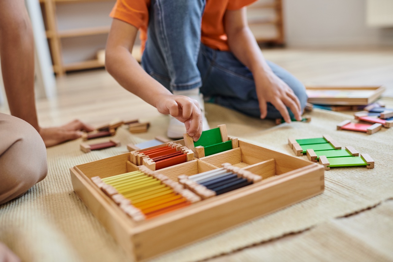 A child engaged in hands-on Montessori learning activities